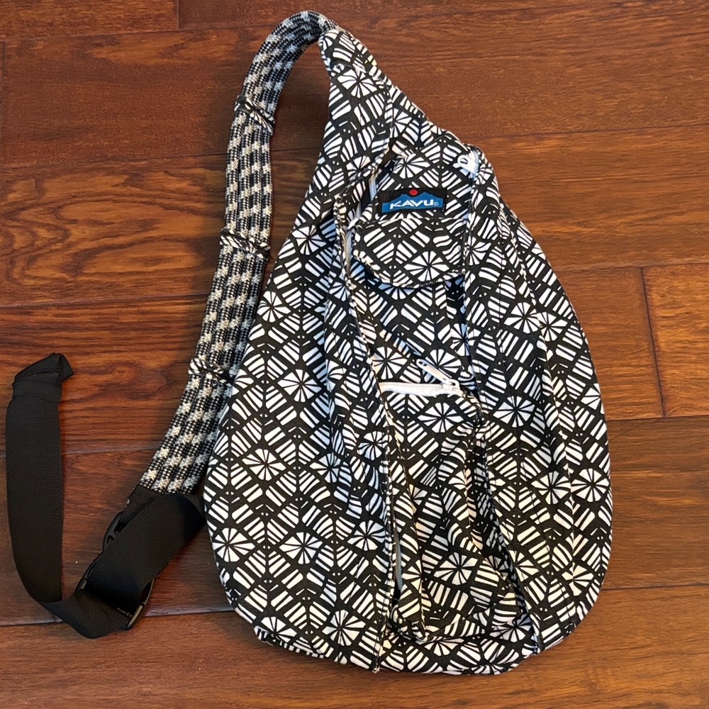 KAVU geometric black and white design crossbody/sling style backpack